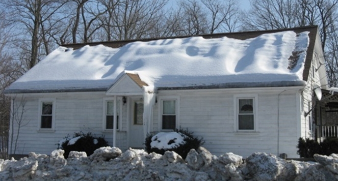 uneven snow on roof