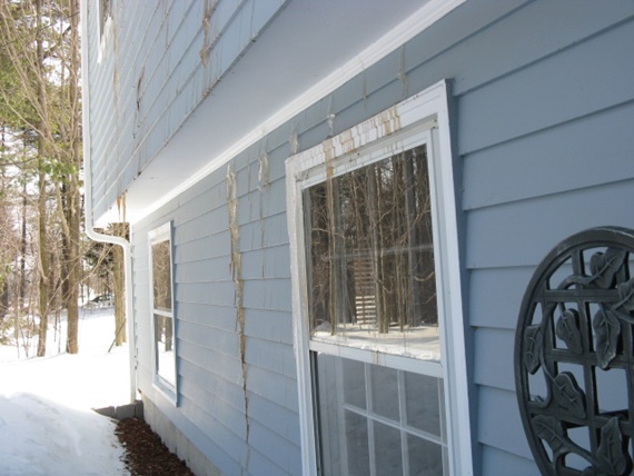 brown ice on siding