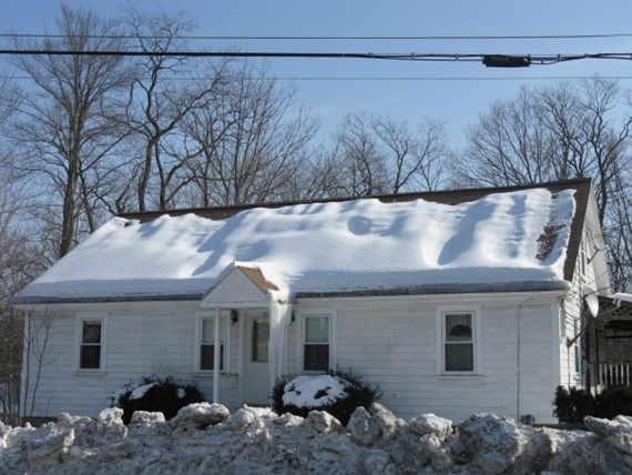 roof ice dam at edge of roof